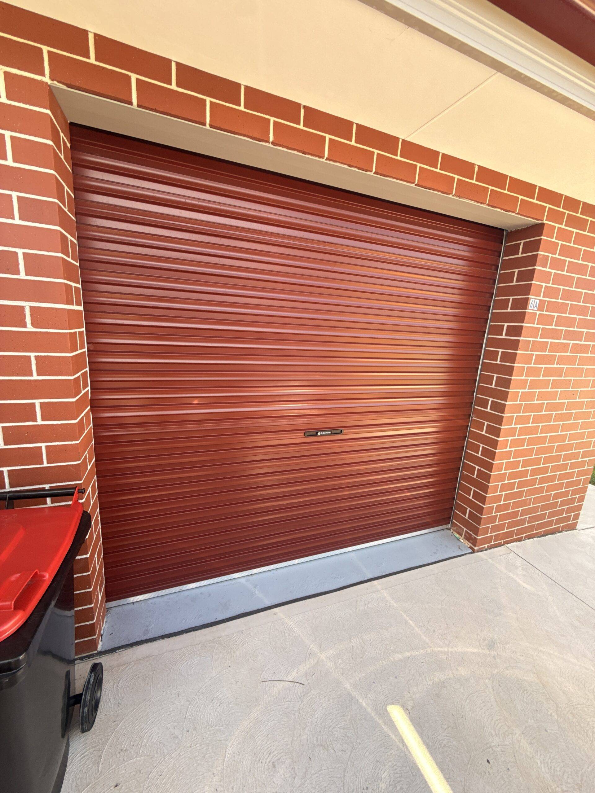 Roller garage door install, Parramatta — ColorBond Monument