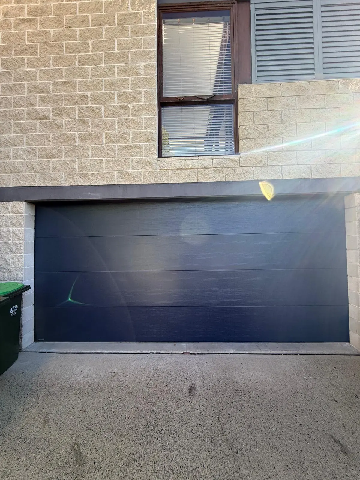 After: Faded → Monument ColorBond completed by Gold Garage Door in Bondi Junction, Sydney